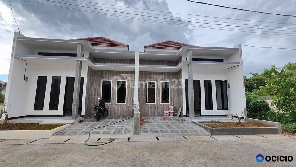 RUMAH MODERN MINIMALIS DALAM CLUSTER LOKASI STRATEGIS