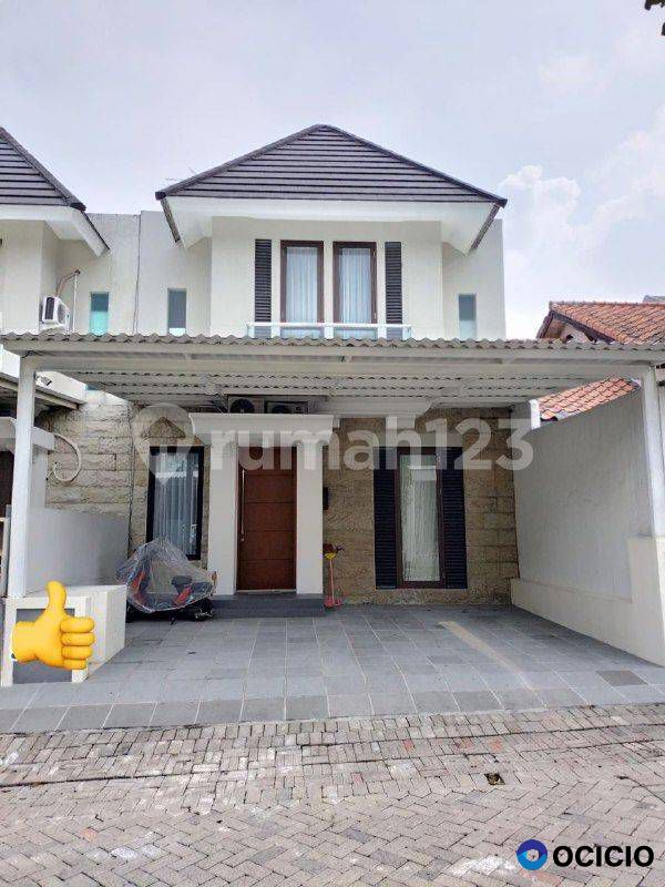 Full Interior Like New Jual Rumah Taman Puspa Citraland Surabaya